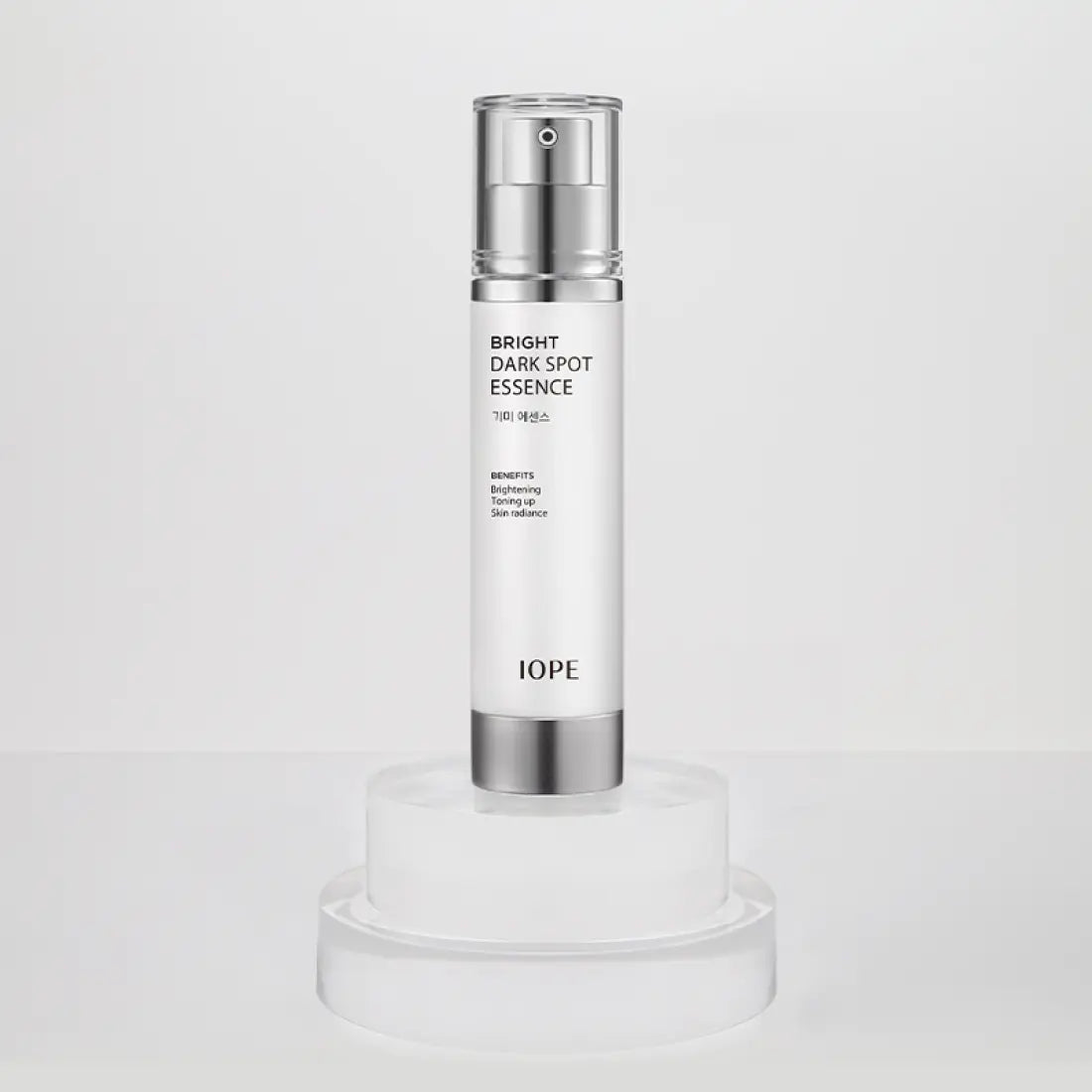 IOPE Brightening Spot Essence 45ml bottle on display, premium skincare product for dark spot correction.