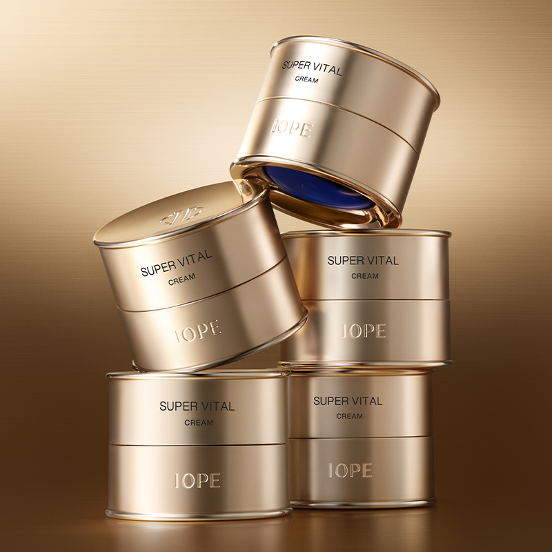 IOPE Super Vital Cream 50ml jars stacked elegantly in a gold aesthetic.