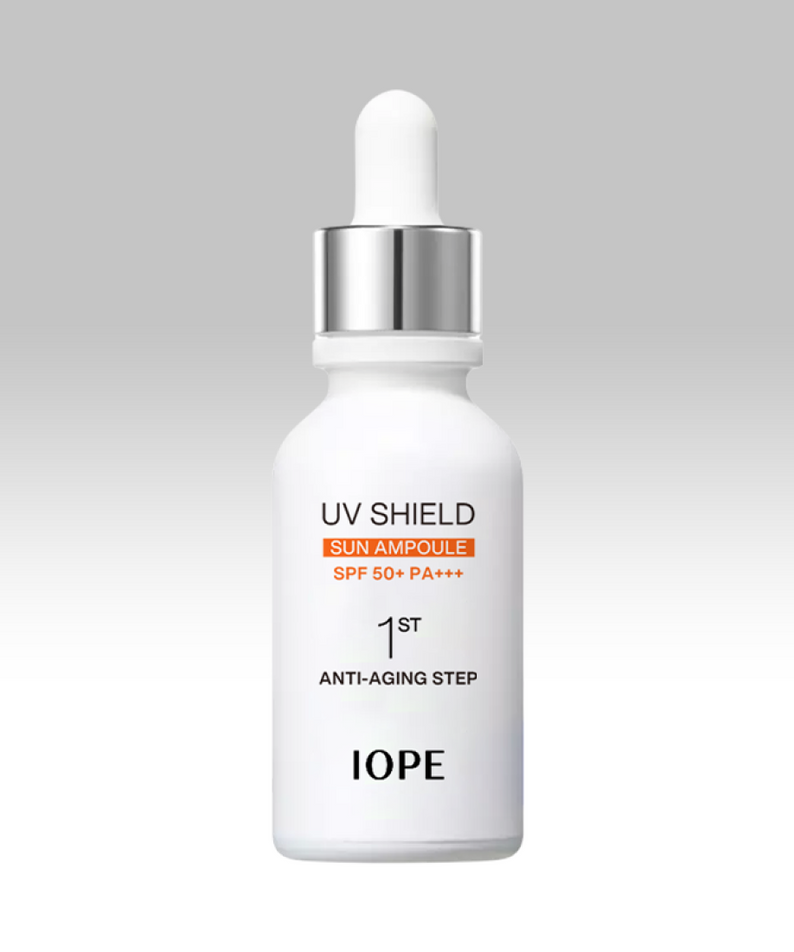 IOPE UV Sheild Sun Ampoule SPF 50+PA+++ 40ml bottle against a soft gray background.