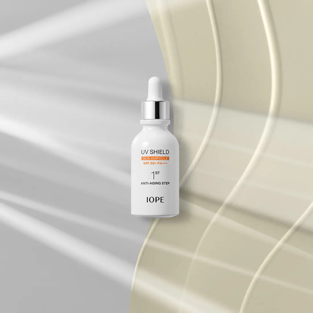 IOPE UV Sheild Sun Ampoule SPF 50+PA+++ 40ml on a sleek, modern background highlighting its anti-aging properties.