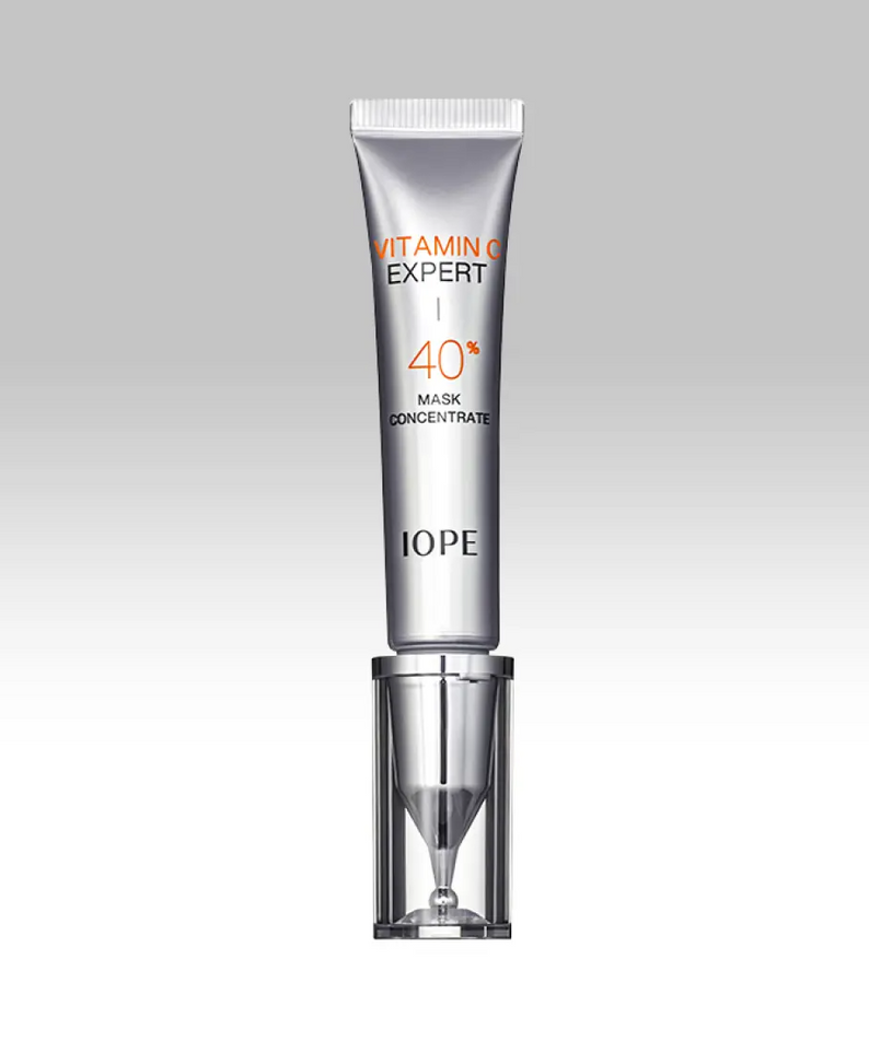 IOPE Vitamin C Expert 40% Mask Concentrate 15g in silver tube packaging on a gradient background