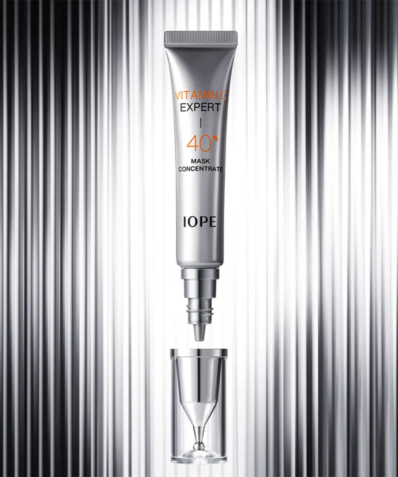 IOPE Vitamin C Expert 40% Mask Concentrate 15g on metallic background showing product tube and packaging
