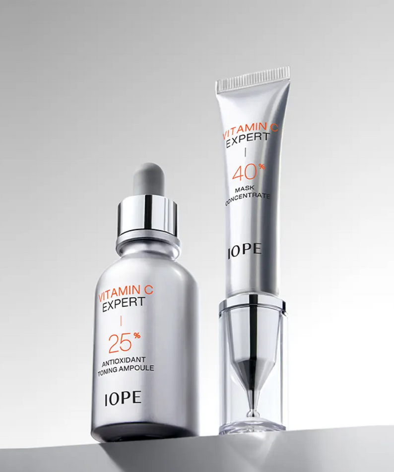 IOPE Vitamin C Expert 40% Mask Concentrate 15g shown with a 25% antioxidant toning ampoule bottle on gray background