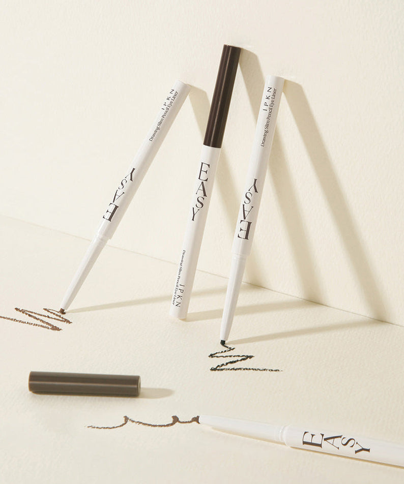 IPKN Easy Drawing Slim Pencil Eyeliner displayed on a light background with swatches, showing its precision and smooth application.