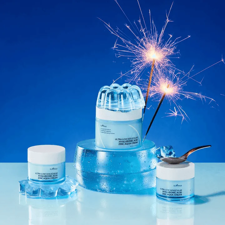 ISNTREE Hyaluronic Acid ZINC Moisture Cream 80ml displayed with sparklers on a blue background
