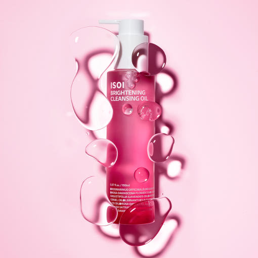 ISOI Brightening Cleansing Oil 150ml product image with pink background and oil droplets highlighting the beauty-enhancing properties.