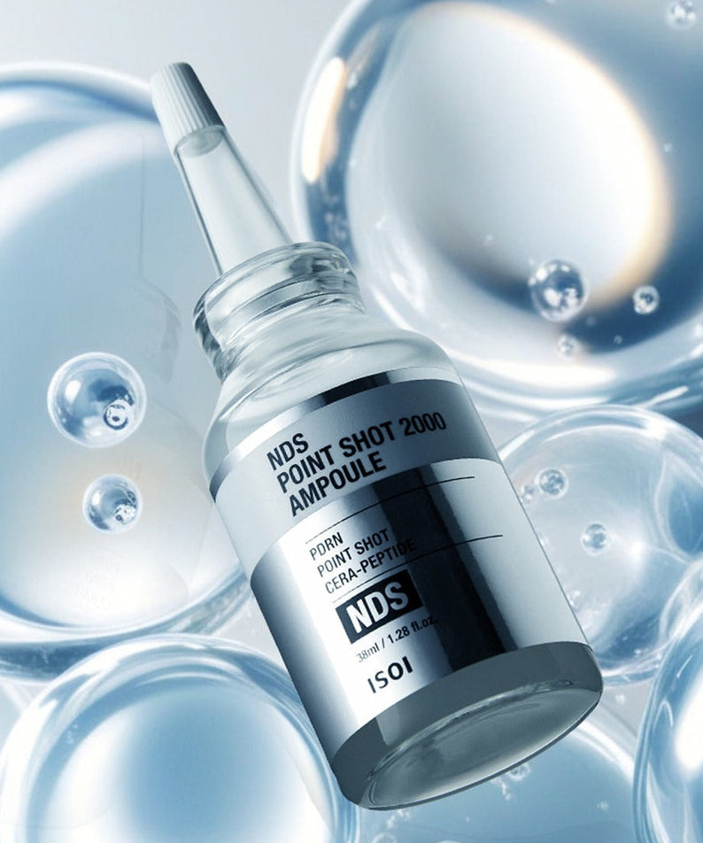 ISOI NDS Point Shot 2000 Ampoule 38ml skincare product bottle with floating bubbles background