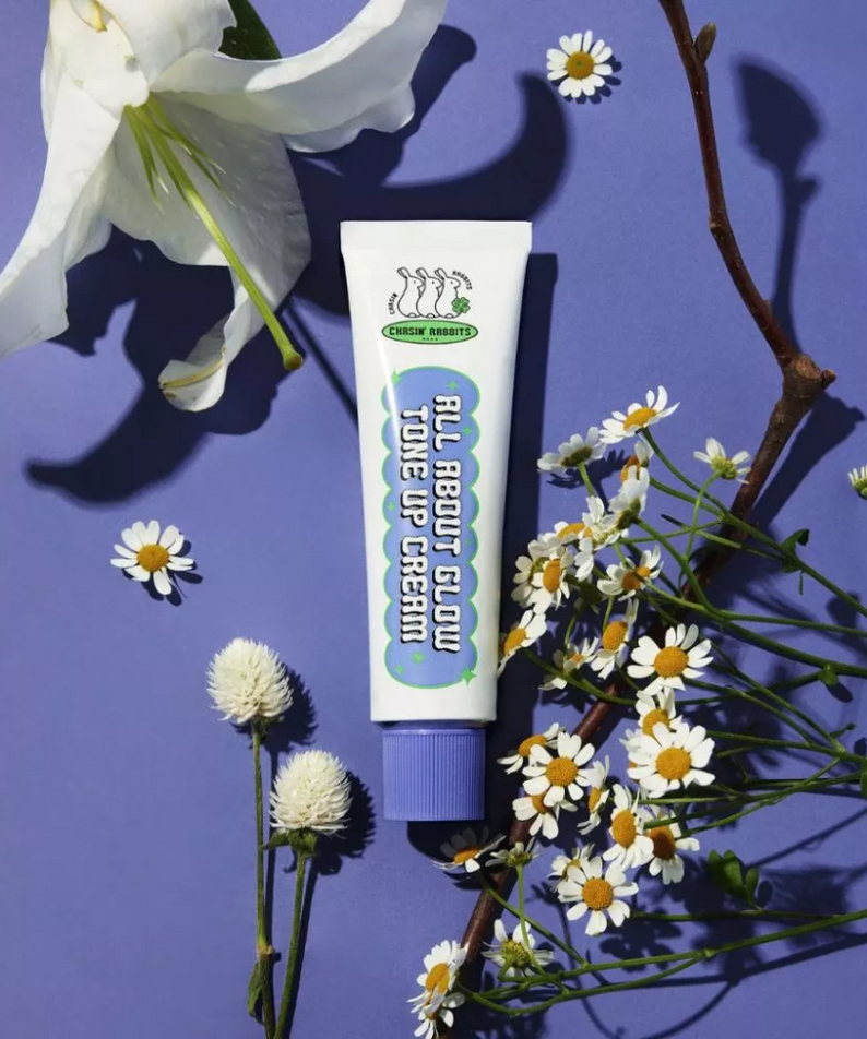 IT'S SKIN All About Glow Tone Up Cream with flowers on purple background