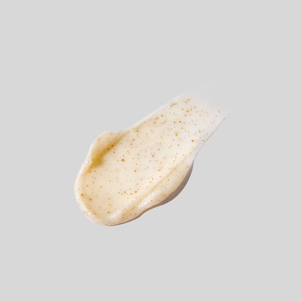 Texture of IT'S SKIN Apple Jam Scrub Foam 120ml showcasing exfoliating granules on a light background.