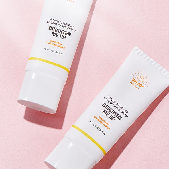 IT'S SKIN Power 10 VC Tone Up Sun Cream 45ml tubes on a pink background