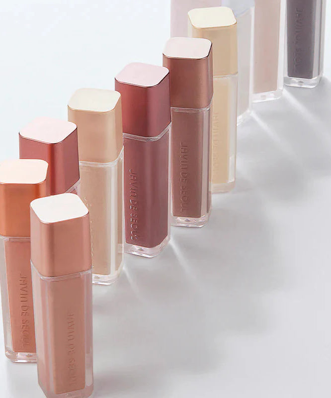 JAVIN DE SEOUL Wink Eye Shimmer Light collection showcasing various shades in elegant packaging.