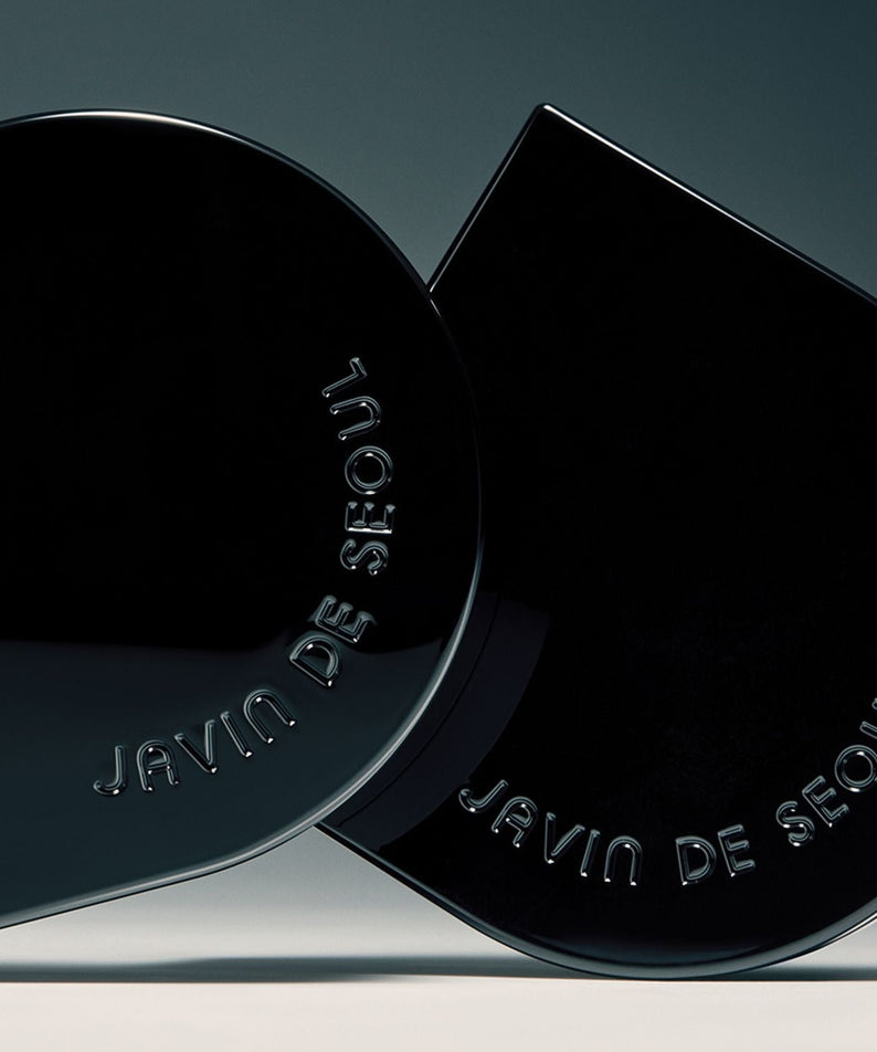 Image of JAVIN DE SEOUL Wink Cushion Glow 16g showing sleek black packaging with brand logo.
