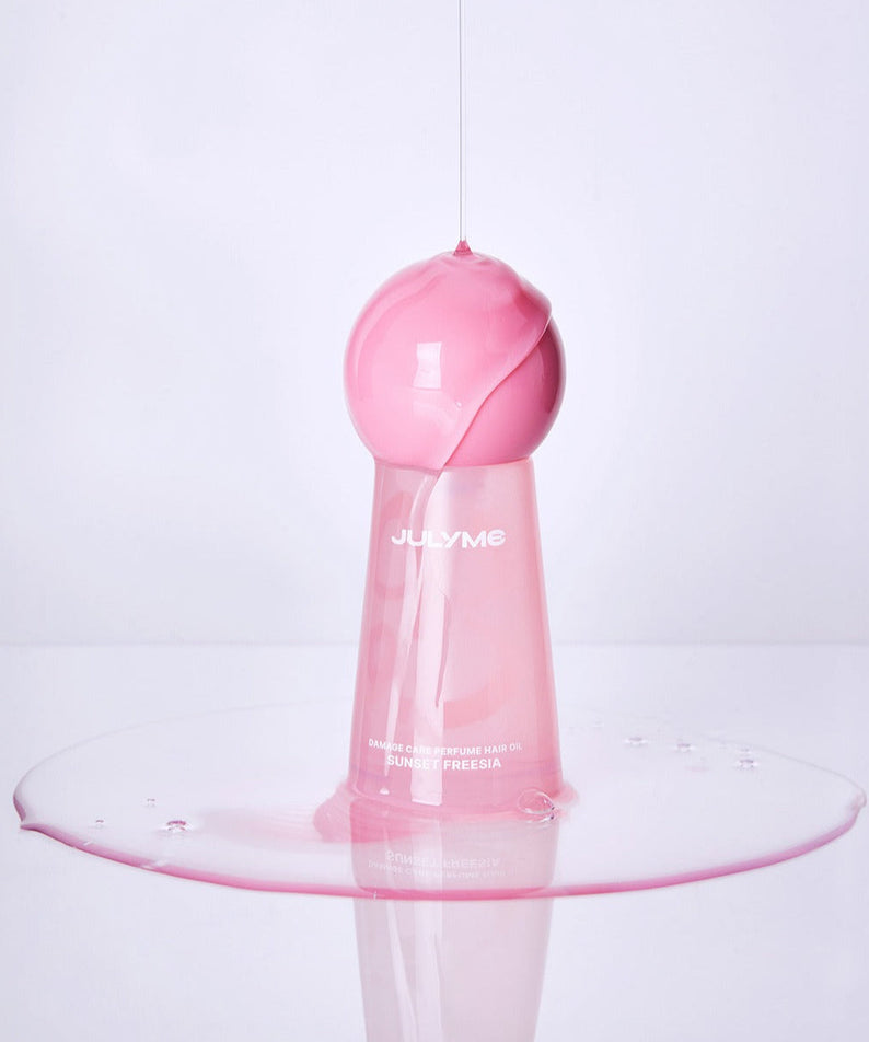 JULYME Damage Care Perfume Hair Oil 30ml bottle with pink liquid design on a white background