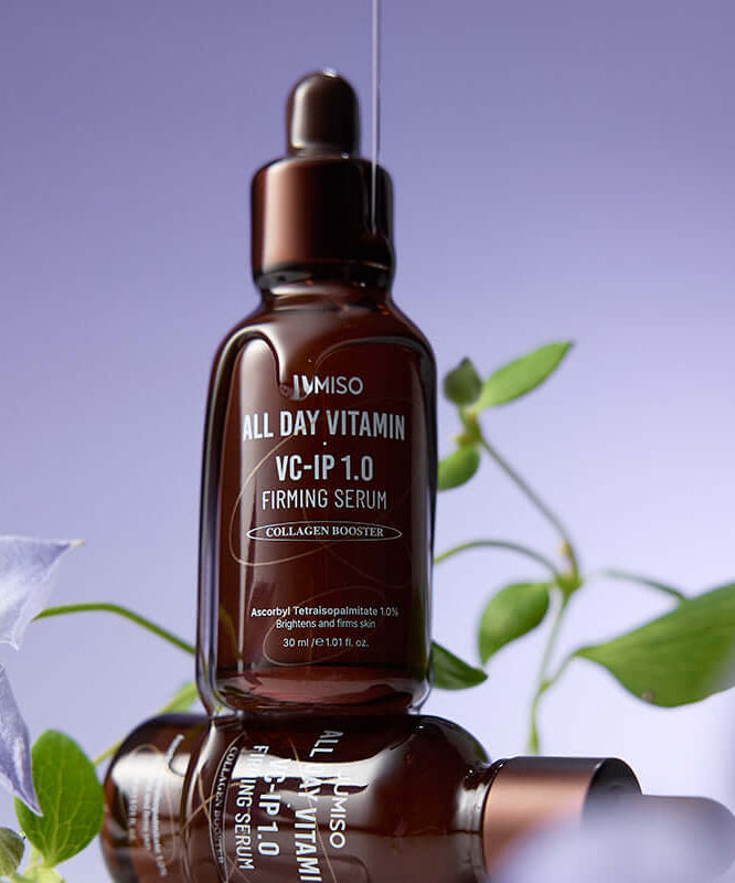 JUMISO All Day Vitamin VC-IP 1.0 Elasticity Serum bottle with floral background