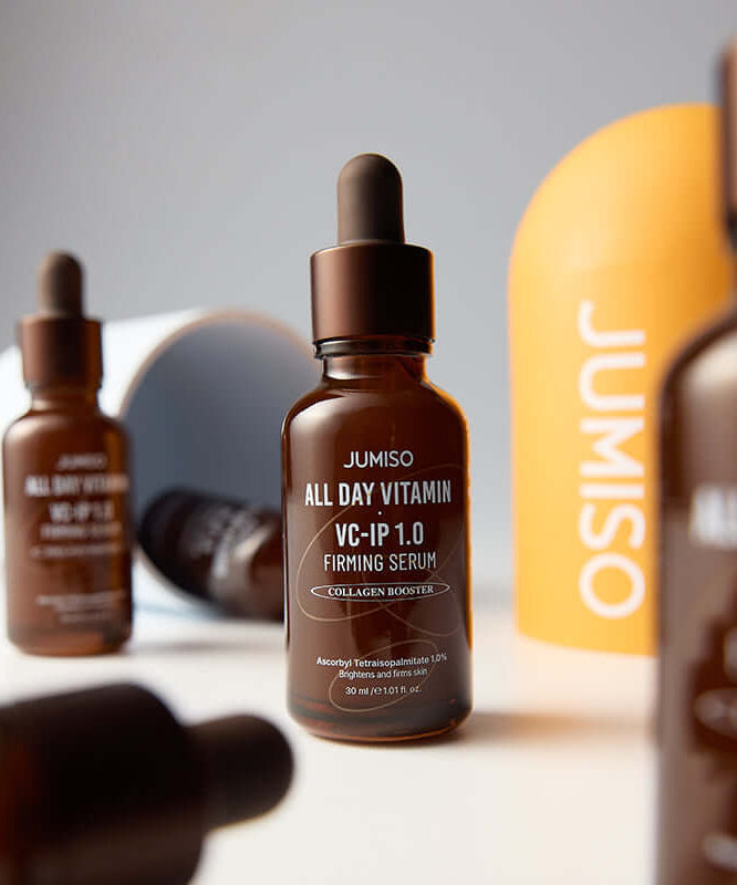 Bottles of JUMISO All Day Vitamin VC-IP 1.0 Elasticity Serum displayed with packaging for skin firming