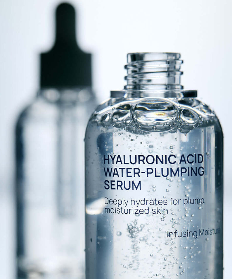 Close-up of JUMISO Hyaluronic Acid Water Plumping Moisture Serumm bottle, highlighting hydrating formula for moisturized skin.