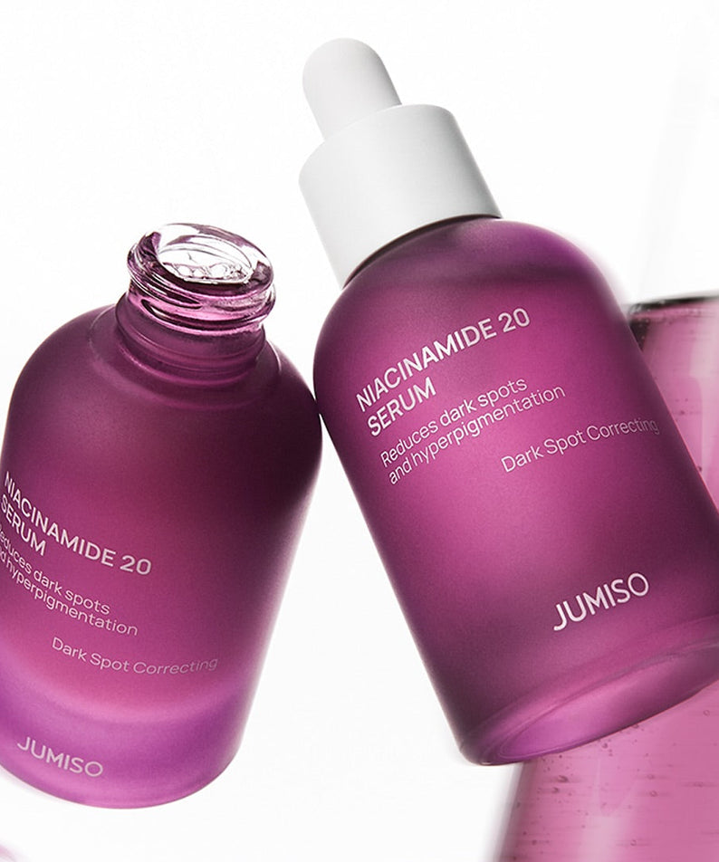JUMISO Niacinamide 20 Serum 40ml for reducing dark spots and hyperpigmentation in purple glass bottles.