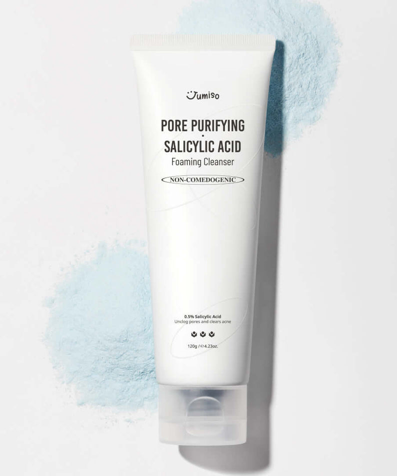 JUMISO Pore Purifiying Salicylic Acid Foaming Cleanser bottle against a blue background