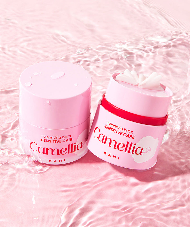 KAHI Cleansing Balm Sensitive Care 50ml on textured surface, showcasing skincare product for sensitive skin.
