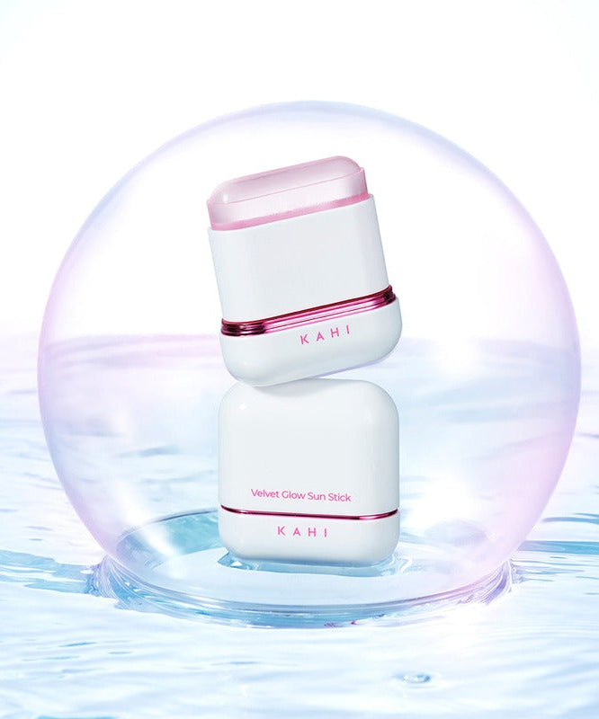 KAHI Velvet Glow Sun Stick 13.5g in a stylish protective case with a reflective surface, highlighting its premium design and quality.