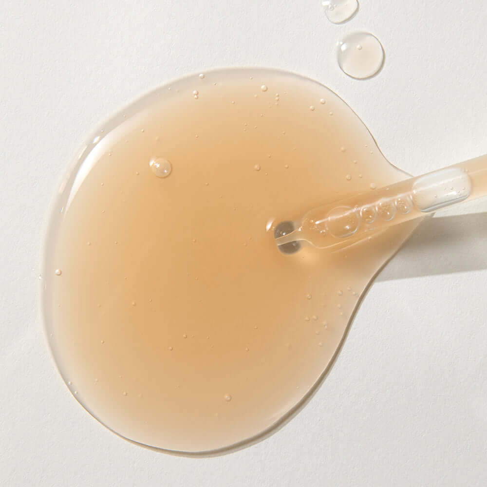 KAINE Kombu Barrier Ampoule serum texture with dropper, showcasing rich formulation for skincare benefits.