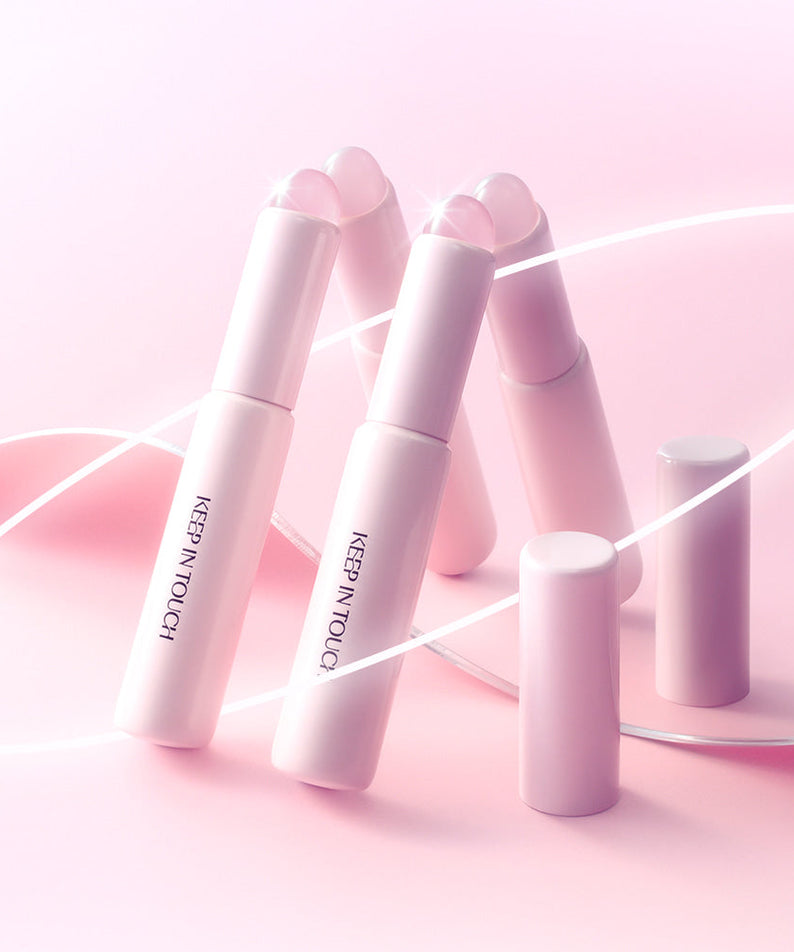 KEEP IN TOUCH Soft Jelly Blurring Lip Brush displayed stylishly with a pink background.