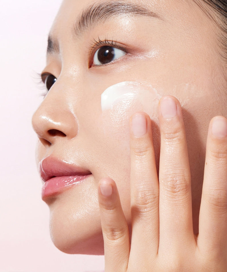 Applying KLAIRS Maple Energy Infusing Cream 60g on face for skincare
