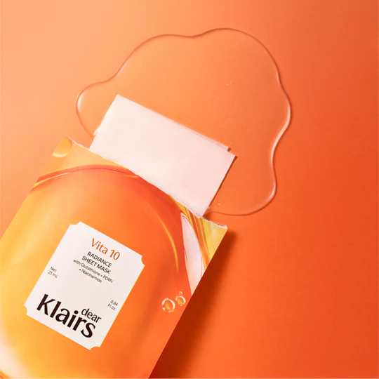 KLAIRS Vitamin Vitality Sheet Mask 25ml 1sheet spilling essence on an orange background