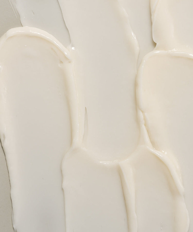 Texture of LADOR Herbalism Treatment 150ml displayed on a surface highlighting creamy consistency.