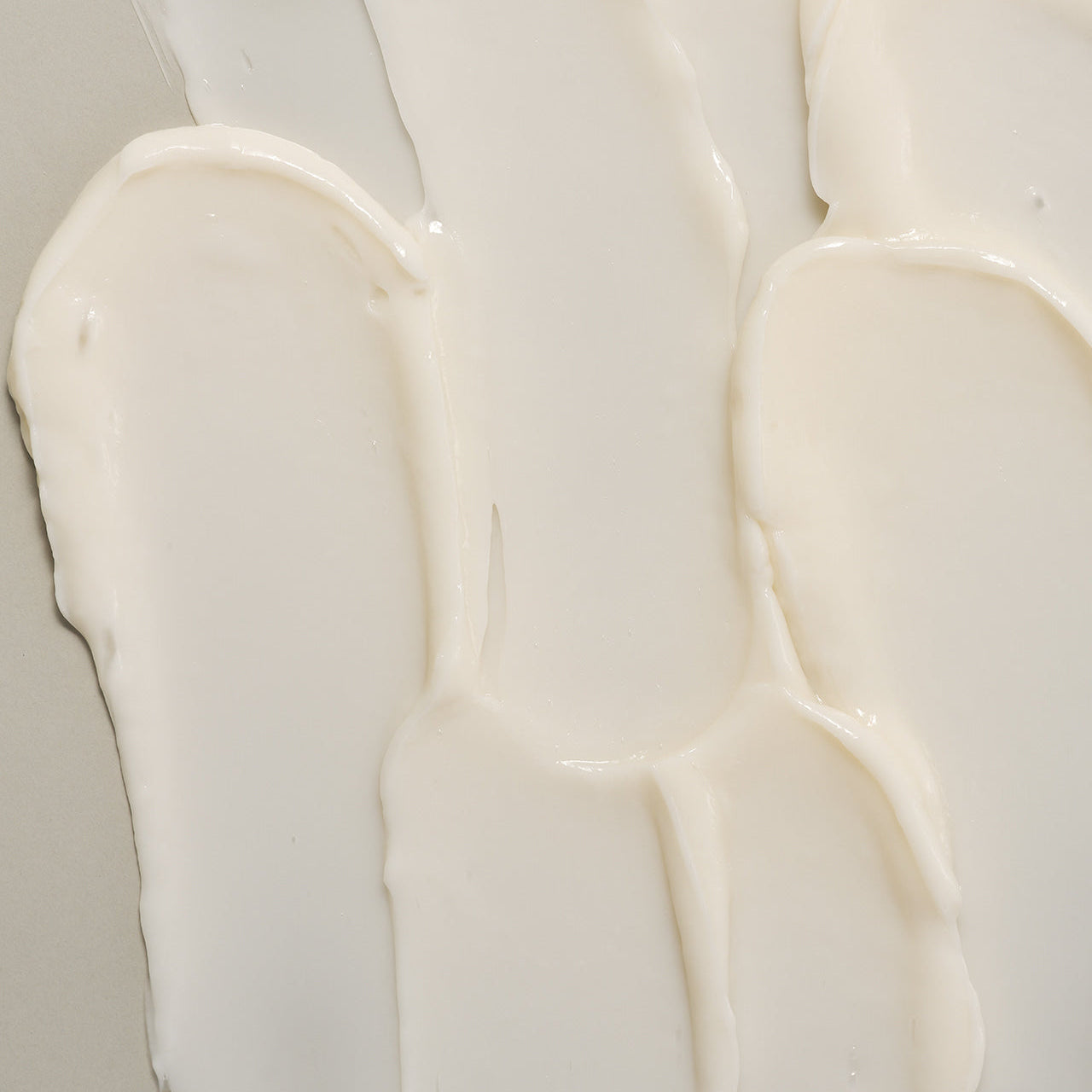 Texture of LADOR Herbalism Treatment 150ml displayed on a surface highlighting creamy consistency.