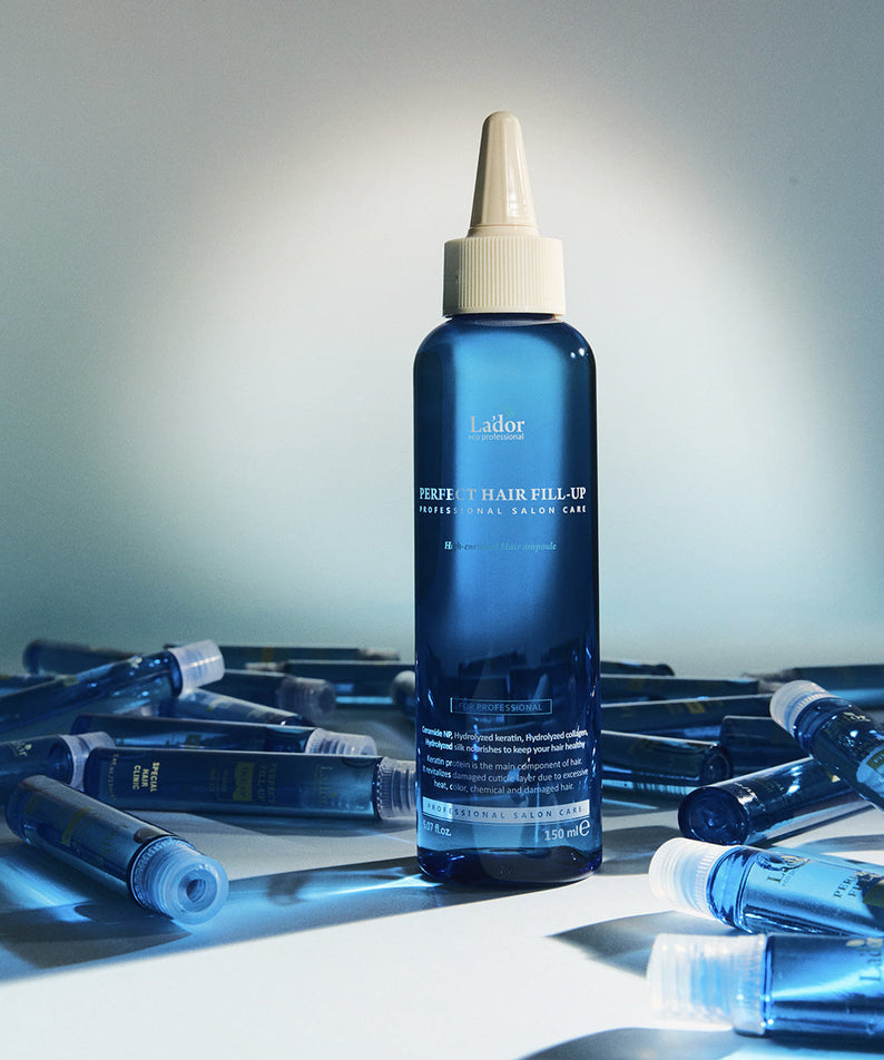 LADOR Perfect Hair Fill-Up 150ml bottle with background vials, hair treatment product.