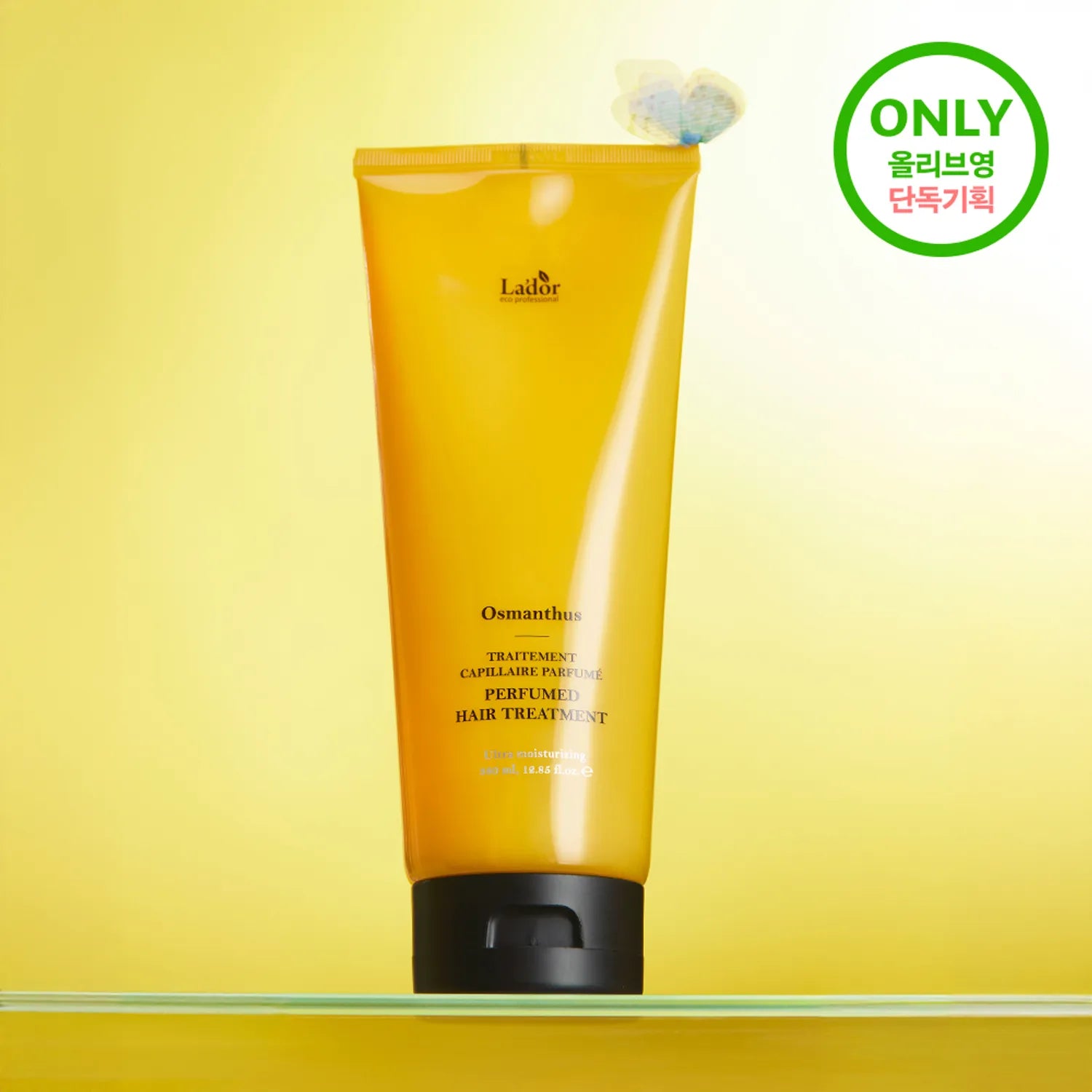 LADOR Perfume Hair Treatment 380ml bottle on a display with yellow packaging and product branding.