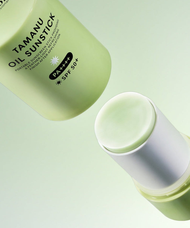 LADOR Tamanu Oil Sun Stick 21g, luxury skincare with SPF 50 protection, green stick design.