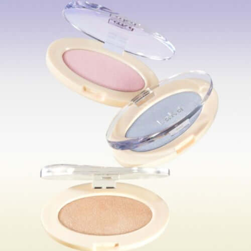 LAKA DreamBeam Higlighter in various shades of pink, blue, and gold with open cases showcasing the product.