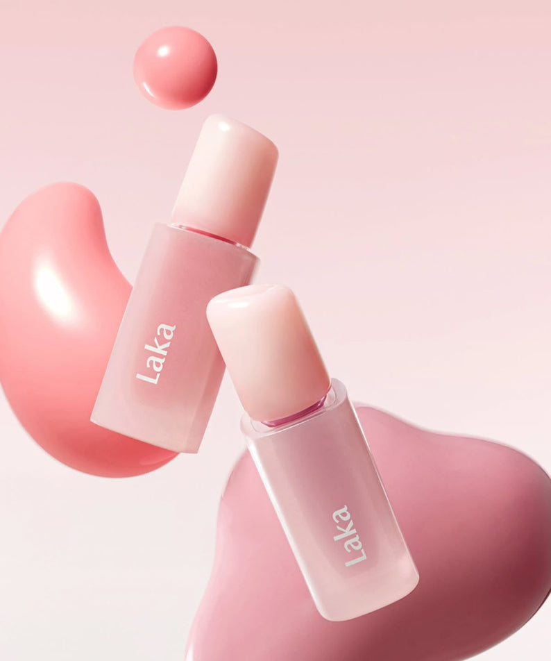 LAKA Popping Ballon Tint in pink shades with artistic splashes, perfect for vibrant lip color.