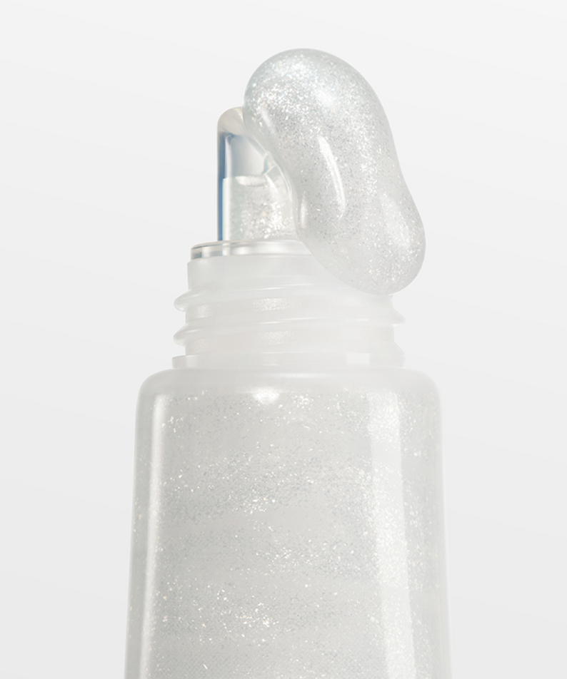 Close-up of LANEIGE Lip Glowy Balm (Milky Way/Pink Supernova) 10g showing the applicator and shimmering texture.