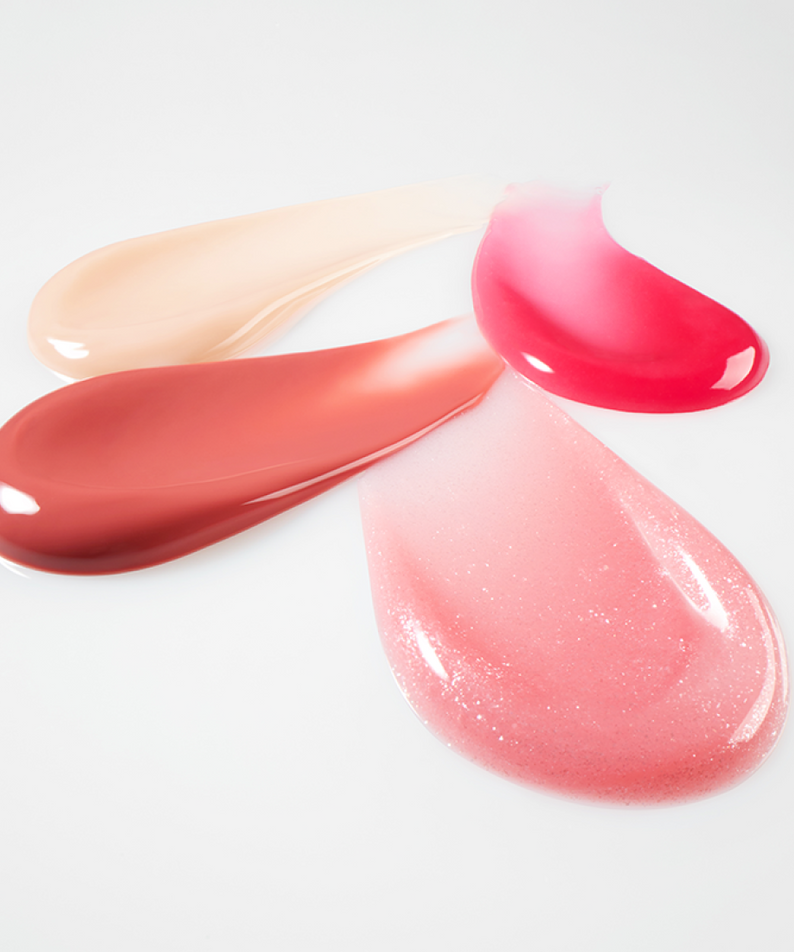 Swatches of LANEIGE Lip Glowy Balm (Milky Way/Pink Supernova) 10g displaying vibrant shades and glossy textures.
