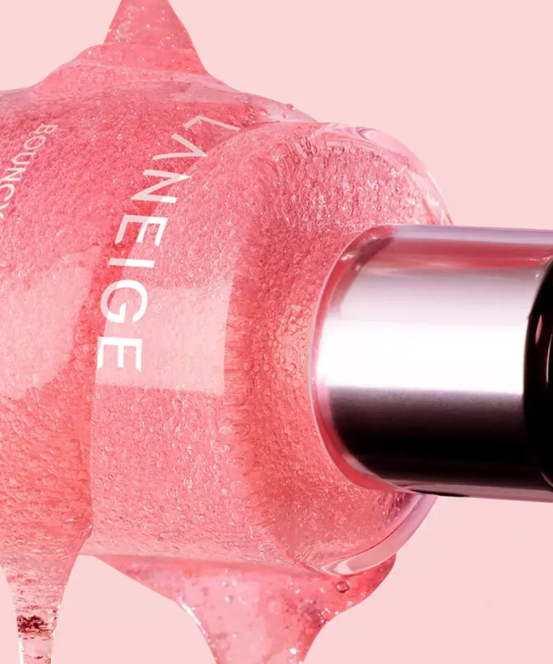 LANEIGE NEW Bouncy & Firm Serum 30ml with pink gel texture in background.