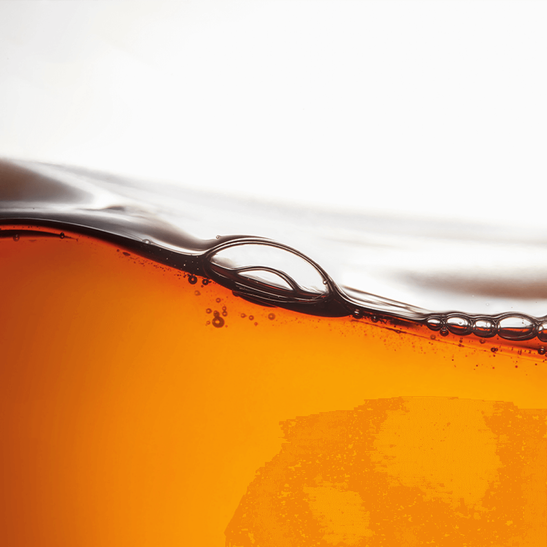 Close-up of liquid soap texture in LANEIGE Perfect Renew Nourishing Oil To Foam Cleanser 200ml.