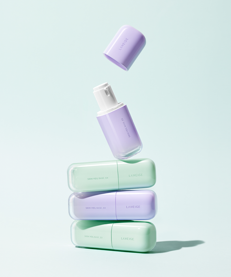 LANEIGE Skin Veil Base SPF28/PA++ 30ml bottles in pastel colors on display.