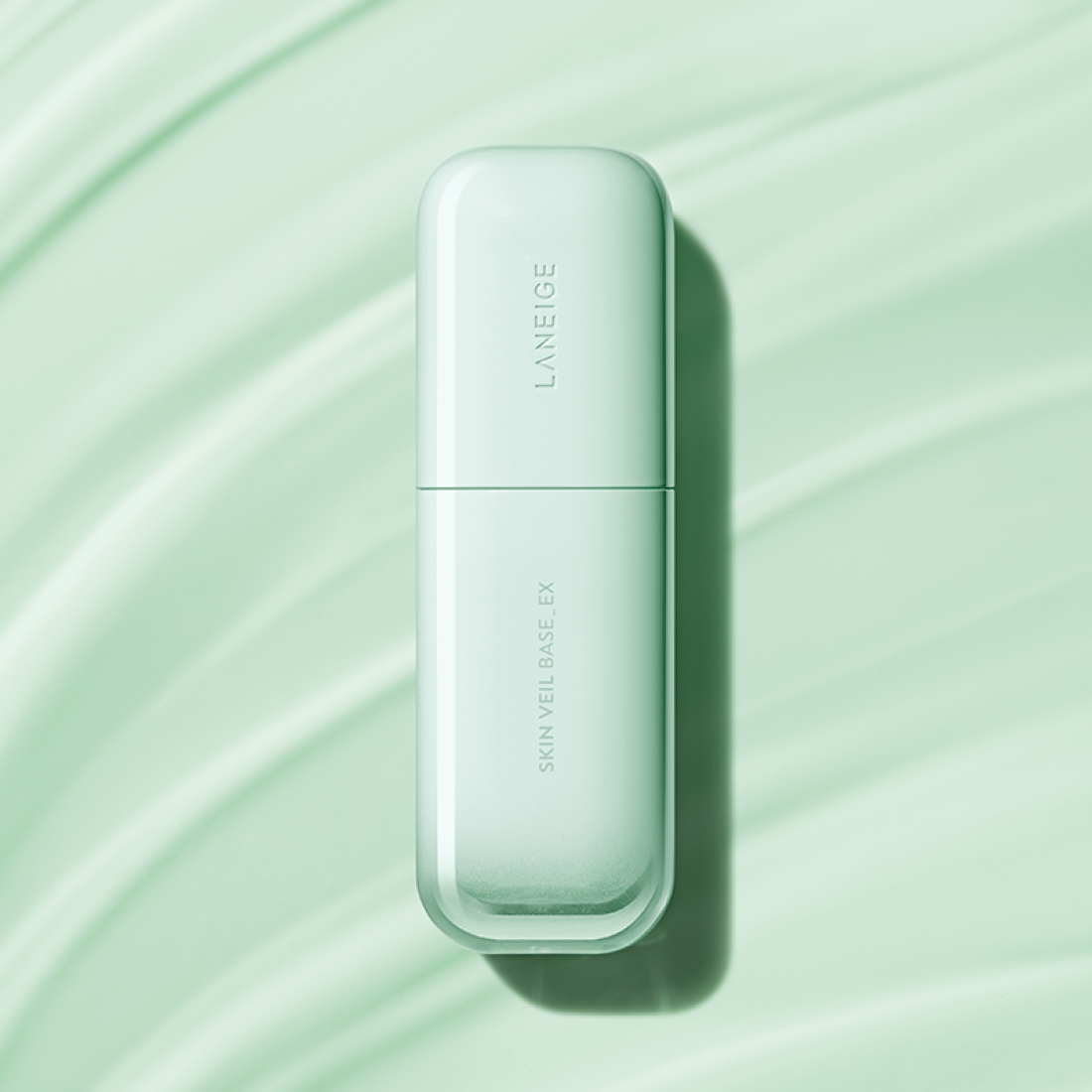 LANEIGE Skin Veil Base SPF28/PA++ 30ml, mint green bottle on matching background