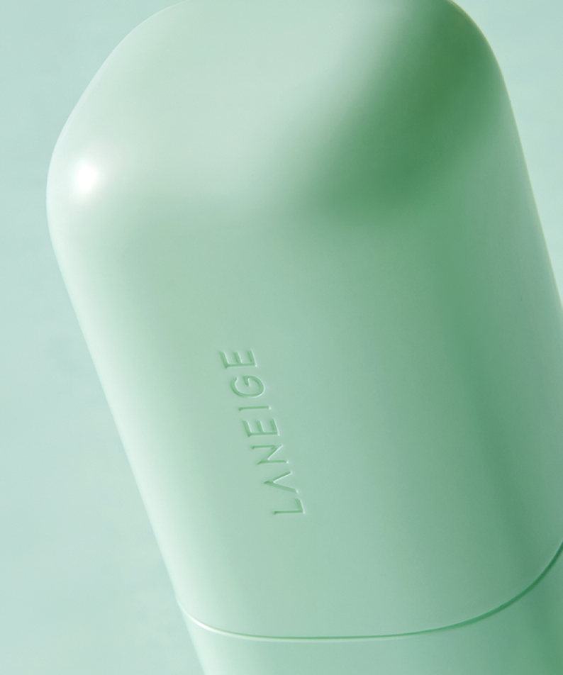 LANEIGE Skin Veil Base SPF28/PA++ 30ml bottle close-up on green background