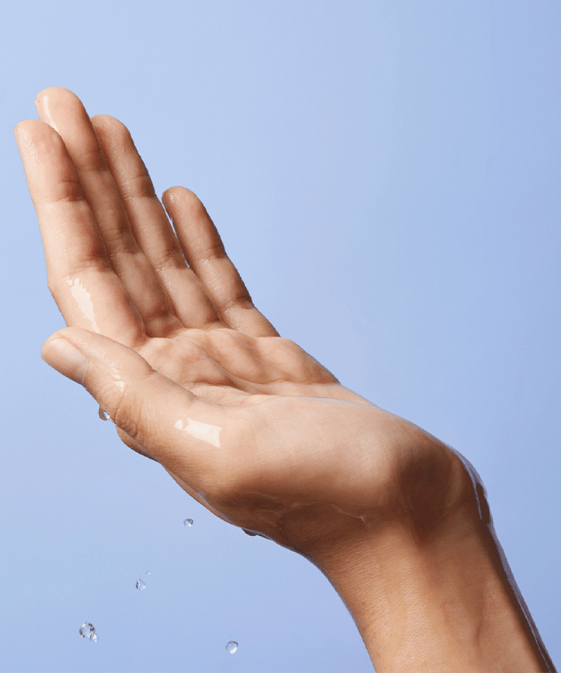 A hand with water droplets showcasing hydration, emphasizing the LANEIGE Water Bank Gentle Gel Cleanser 250ml's moisturizing effects.