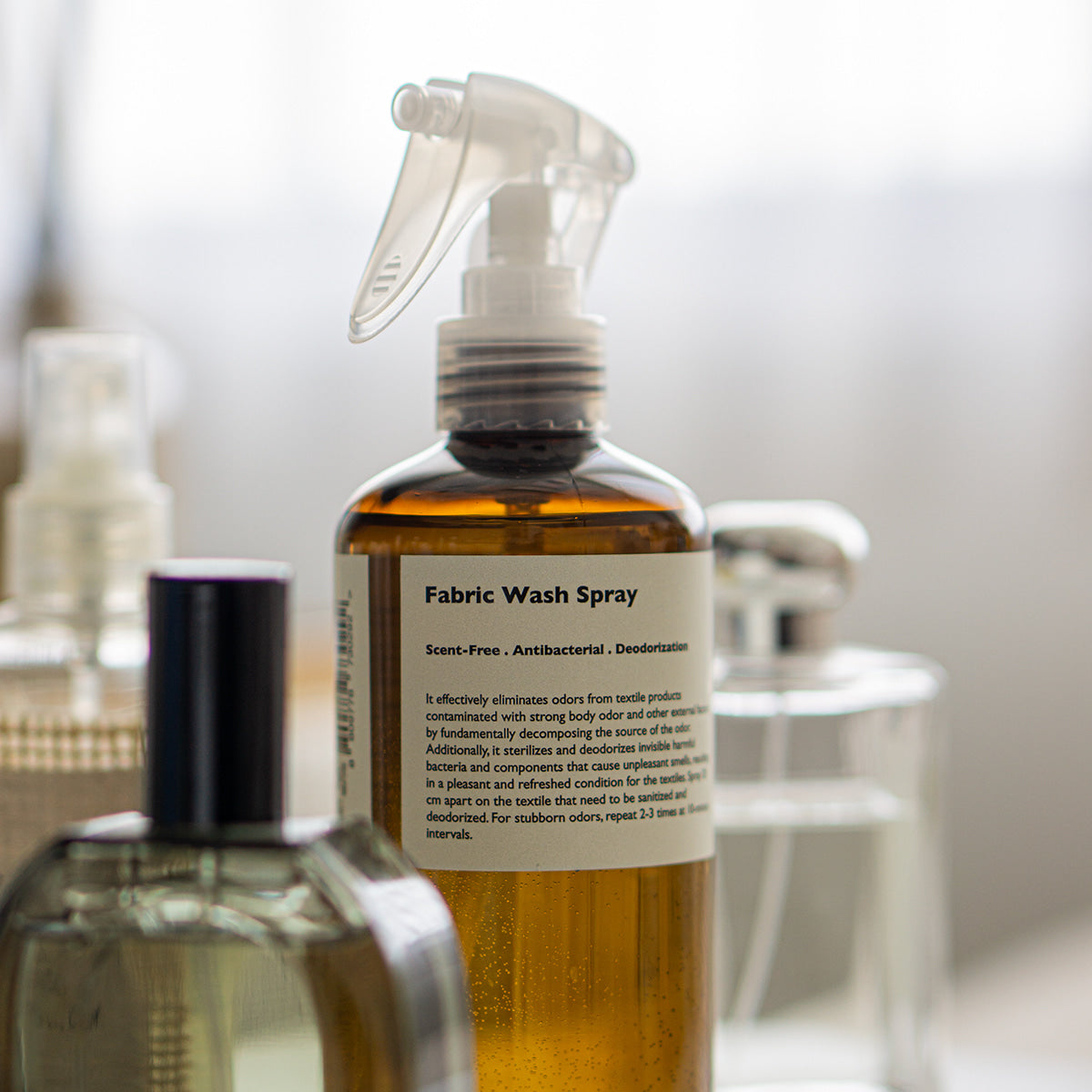 LAZY SOCIETY Fabric Fresh Spray 300ml glass spray bottle on vanity, Gentleman Korea men's fabric freshener for garments and linens