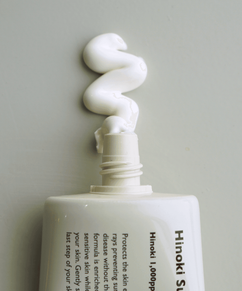 LAZY SOCIETY Hinoki Sunscreen SPPF 50+ PA+++ 50ml tube with white sunscreen cream swirled on top – Gentleman Korea skincare for men