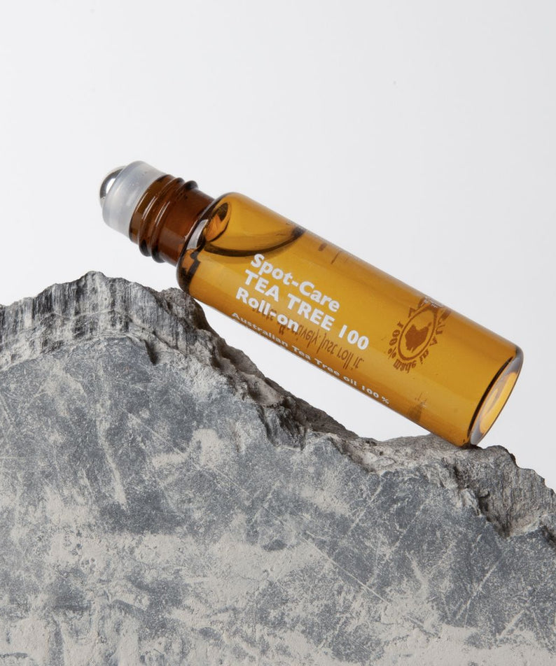 LAZY SOCIETY Spot Care Tea Tree 100 Roll on 5.5ml on stone prop, Korean skincare for men by Gentleman Korea