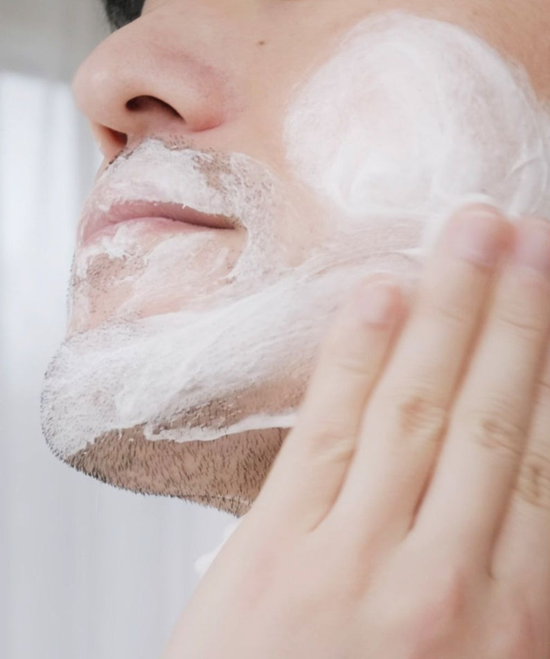 LAZY SOCIETY Superme Shaving Cream 100ml lathering on a gentleman’s face applied by hand — Korean men’s grooming by Gentleman Korea