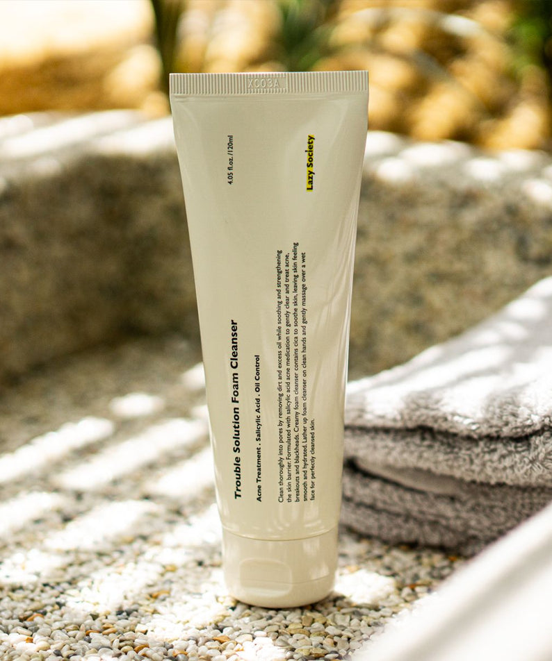 Gentleman Korea product shot of LAZY SOCIETY Trouble Solution Foam Cleanser 120ml tube on towel for men’s Korean skincare