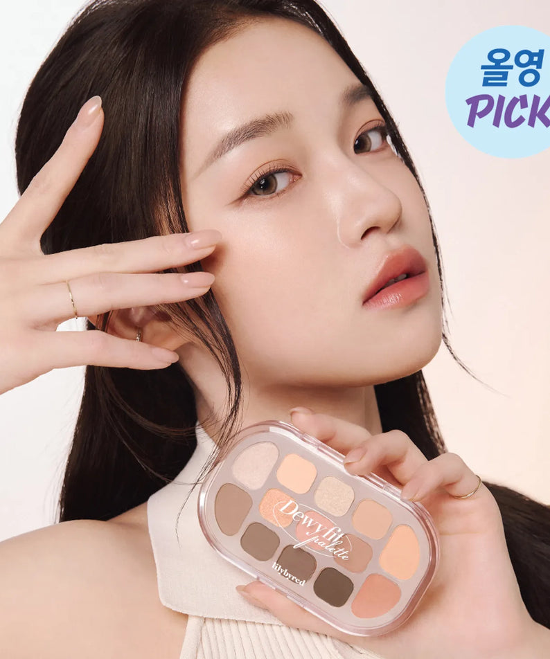 Woman holding LILYBYRED Dewy Fit Palette showcasing makeup shades