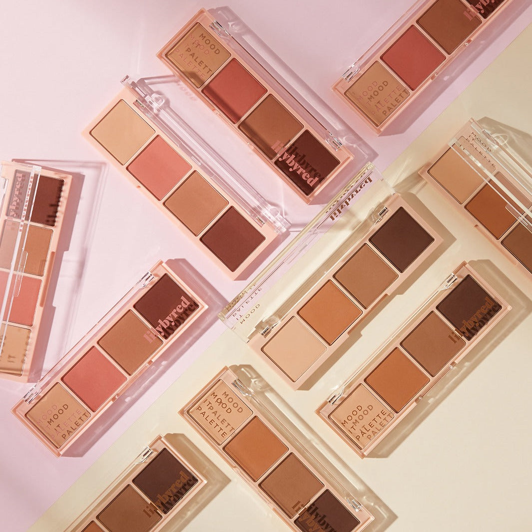 Assorted LILYBYRED Mood It Palette shades displayed, highlighting makeup colors and textures.